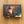 Load image into Gallery viewer, Lantern and Pine Cone Wooden Box style sign